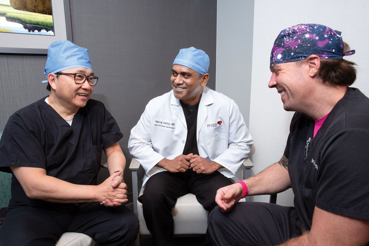 Brachytherapy pioneer Dr. Joseph Kam Chiu discusses the procedure with interventional cardiologists Dr. Natraj Katta and Dr. Brock Cookman of Bryan Heart.