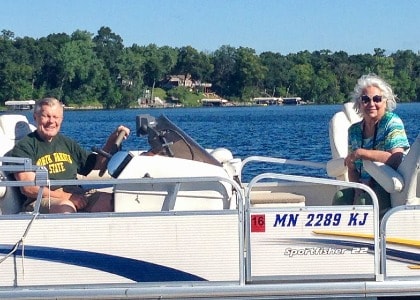 John and April Sampson on a boat