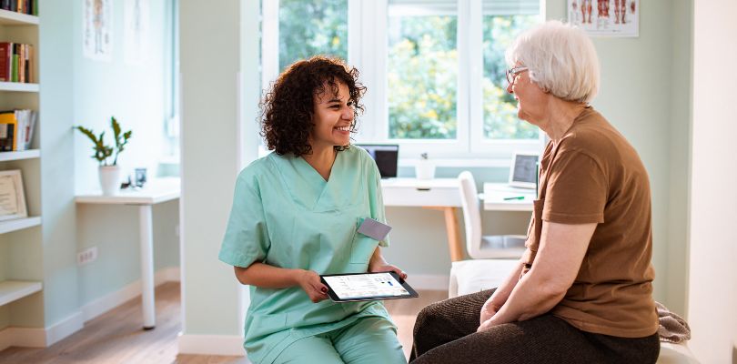 man drinking coffee and using virtual care